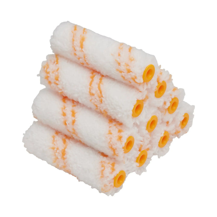Set of paint rollers with white sleeves and orange handles on a white background