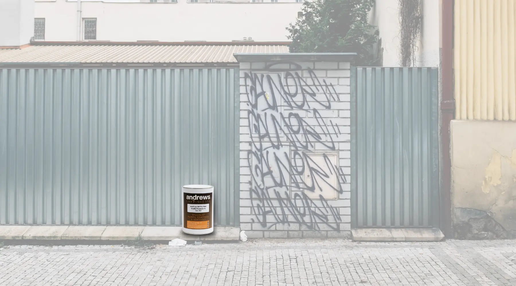 Graffiti on concrete blockwork with metal cladding fencing showcasing Off The Wall Graffiti Protector