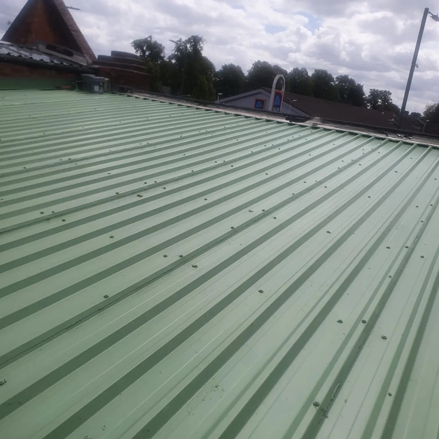 Roof coating in reseda green Ral 6011 - Using AndCoat WB Acrylic