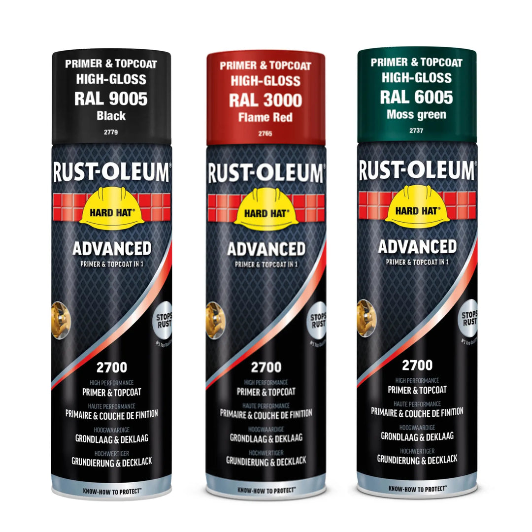 Three Rust-Oleum spray paint cans in different colors on a white background