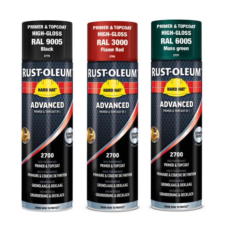 Three Rust-Oleum spray paint cans in different colors on a white background