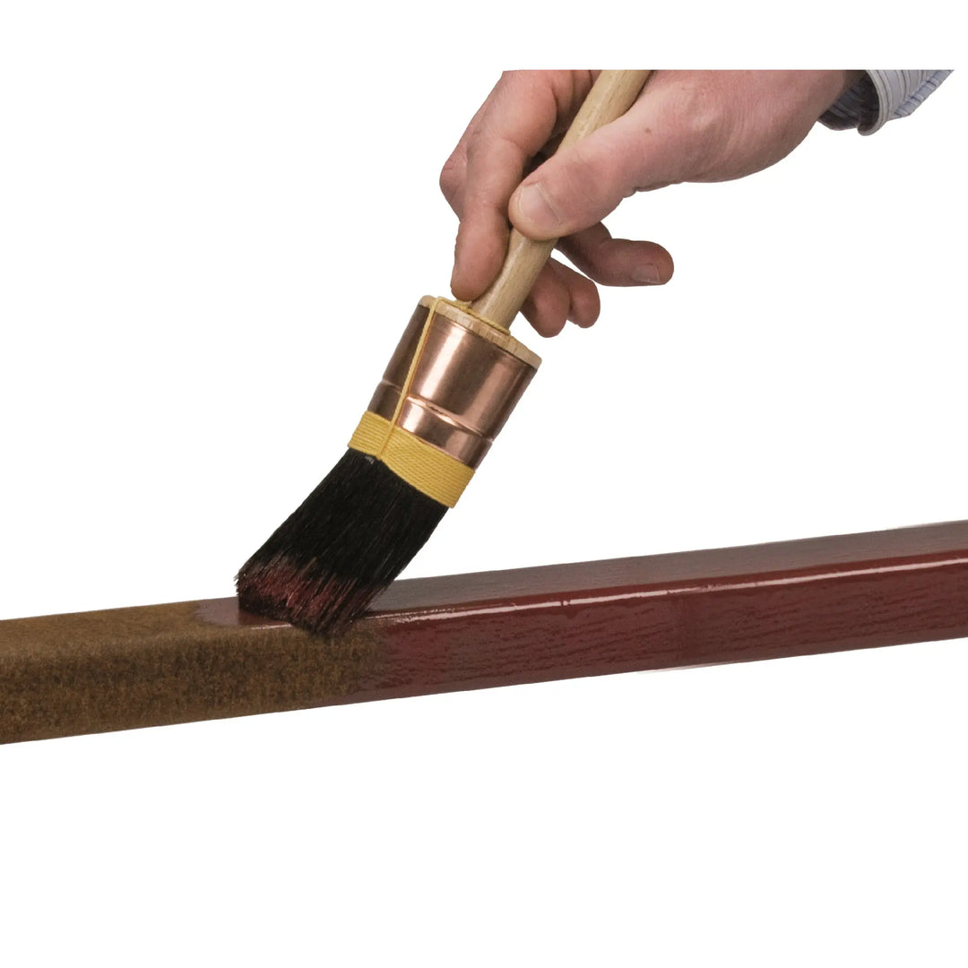 Rust-Oleum 769 application via a sash brush onto rusty metal 
