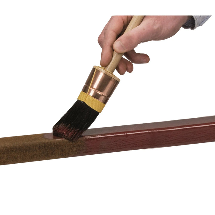 Rust-Oleum 769 application via a sash brush onto rusty metal 