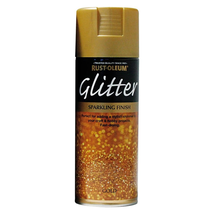 Gold glitter spray paint can with Rust-Oleum branding on a white background