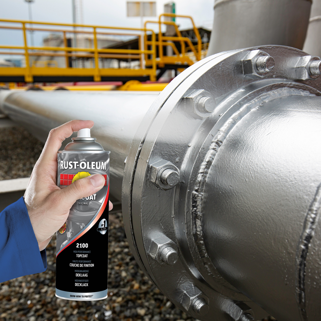 Rust-Oleum Hard Hat Metallic 500ml being applied to metal